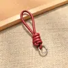 Bolsa de Corda de Couro PU Colorida Pingente Estilo Miu Simples Versátil Charme de Bolsa Chaveiro Acessório Lanyard de Celular Estilo Curto Novo