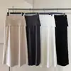 Falda larga de punto gris estilo coreano con retazos y detalle en el dobladillo para mujer, otoño, de alta gama, fluida, estiliza la figura, elegante, casual, línea A