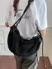 Bolso casual de gran capacidad para mujer, nuevo bolso tipo albóndiga de gamuza vintage otoño 2026, bolso de hombro y cruzado casual para el trabajo