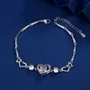 Venta caliente transfronteriza Pulsera de proyección de corazón torcido nueva diseño de nicho de personalidad femenina Pulsera de foto a color HD de 100 idiomas