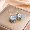 Pendientes de Moda Europeos y Americanos Tiliani de Venta Cruzada Estilo Simple con Cierre Grande de Ocho Garras con Piedras Preciosas Al por Mayor