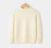 Suéteres infantiles al por mayor transfronterizos para otoño e invierno, cuello medio alto, color liso, tejido suave y cálido para niños y niñas