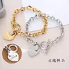 Pulseira Cruzada Europeia e Americana de Aço Inoxidável em Formato de Coração com Fecho OT, Joia Versátil Personalizada, Pulseira de Aço Titânio da Moda Atacado