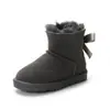 Venta al por mayor de fábrica Botas de Nieve para Niños de Lana Integrada con Piel Sintética Zapatos de Algodón de Cuero Genuino Botas Cortas Engrosadas con Lazo para Niñas Pequeñas y Medianas