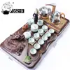 Bandeja de té para el hogar Mesa de té de madera Juego de Mar de Té grande de una sola pieza cuatro en uno soporte para estufa eléctrica automática generación