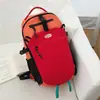 Mochila impermeable de color contrastante ligera transfronteriza casual de gran capacidad para ciclismo bolsa para deportes al aire libre montañismo mochila escolar mujeres