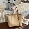 Bolso grande para mujer 2026 nuevo bolso de hombro de moda primavera-verano, bolso tote de nicho de gran capacidad para la escuela y el trabajo