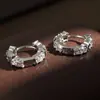 Rakol 2025 Novos Brincos Versáteis de Cobre com Luz Fria Inlaid Zircônio Letra X Cruz para Mulheres