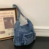 Bolsa de mezclilla casual de gran capacidad para mujer, nuevo modelo 2026, mochila para la ciudad, bolso de hombro y cruzado multiusos, moderno