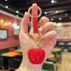 Pingente Chaveiro de Carro Pequena Maçã 3D Cravejado de Strass Transfronteiriço, Acessório Versátil para Bolsas Femininas, Charme de Luxo, Pequeno Presente