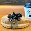 Llavero creativo de coche de policía militar de fricción, divertido para desestresar, juguete para estudiantes, colgante, accesorios para bolso, regalos pequeños al por mayor