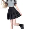 Falda blanca de tiro alto para mujer, nuevo estilo primavera-verano 2026, anti-exposición, adelgazante, petite, línea A alta, casual, falda tulipán