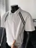 Camisa Polo Estilo Americano Manga Corta Hombre Verano 2026 Nuevo Estilo Rayas en Contraste Marca de Alta Gama Fresca Moderna Camiseta de Manga Media