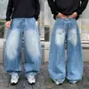 Calça jeans masculina cityboy azul desgastado com perna curva, nova coleção outono 2026, calça longa casual moderna de corte solto