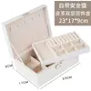 Uma Caixa de Armazenamento de Joias Portátil, Exquisita e Prática de Camada Dupla Que Pode Guardar a Maioria das Joias do Mercado
