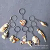 Y11 Colgante de llave llavero de marfil bolsa Colgante de joyería regalo suministro de un yuan al por mayor