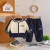 Conjunto de Ropa de Otoño para Niños 2026 Nuevo Bebé Primavera y Otoño Bebé Guapo Conjunto de Dos Piezas de Manga Larga Moda Comercio Exterior al por Mayor