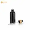 Botellas de vidrio negro directo de fábrica botellas gotero de aceite esencial negro mate spray Botellas de vidrio negro mate para líquidos oscuros materiales de subempaque