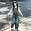 Pantalones vaqueros de pierna ancha para niñas, estilo patchwork de dos piezas falsas, dobladillo con volantes de borde crudo, otoño, estilo coreano, holgados, versátiles, de pierna recta, hasta el suelo