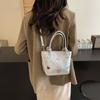 Bolso de mano de gran capacidad con textura de alta calidad para mujer, nuevo bolso de hombro de viaje de moda de otoño 2024, bolso tipo cubo