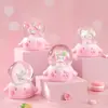 Una Variedad de Lindas Muñecas de Dibujos Animados, Adornos de Bola de Cristal Luminosos, Bolas de Agua de Copos de Nieve, Regalos Creativos para Estudiantes, Juguetes, Pequeños Regalos