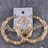 Pendientes de bambú grandes y exagerados con personalidad europea y americana, con letras de princesa y círculos dorados, estilo hip-hop nocturno.
