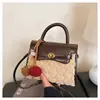 Bolsa Kelly de Lã de Cordeiro de Design de Nicho Transfronteiriço para Mulheres 2026 Novo Modelo Bolsa de Pelúcia de Alta Qualidade Bolsa de Ombro Único Transversal