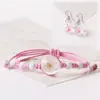 Pulsera de flor seca fresca pequeña y dulce Flor de durazno rosa tejida antigua para adulto estudiante mujer puesto puesto suministro