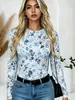 Camiseta feminina de gola redonda e manga longa com estampa floral em aquarela, estilo europeu e americano, elástica, justa ao corpo, versátil e perfeita como camada base.