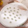Accesorios Metálicos para Uñas Aleación Flor de Cinco Pétalos Arte de Uñas Fábrica Venta al por Mayor Mini Flor de Perla Uso para Uñas Decoración de Uñas