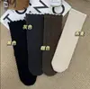 Outono e Inverno Estilo Retro Old Money Meia Ins Renda Padrão Escuro Espiga de Trigo Versátil Estilo Coreano Meia Empilhada Quente Cano Médio-Alto Meias Femininas
