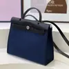 Bolso de Lona Impermeable de Lujo Ligero de Nueva Entrada Transfronteriza Bolso de Inicio Kelly Bolso de Mano para Mujer de Cuero Genuino para Hombro Cruzado