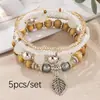 Set de Pulseras Estilo Bohemio con Cuentas Pequeñas y Colgantes de Hojas, Accesorios para Fotos, Venta Directa del Fabricante, Popular en Venta Transfronteriza Estilo Europeo y Americano
