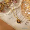 Ani Beni Original Otoño e Invierno Versátil Perla Ojo de Tigre Natural Piedra Collar para Mujer Cadena de Suéter de Cuentas de Piedra Asimétrica