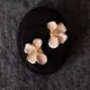 Nuevos Pendientes Versátiles de Flor Rosa Estilo Chino Modelo Nuevo 2026 Lujo Ligero Aspecto de Gama Alta Pendientes Súper Bonitos Más Vendidos para Mujeres