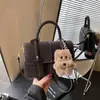 Bolso de Mano Pequeño de Diseño Nicho Coreano para Mujer Moda Invierno 2025 Bolso Cuadrado Pequeño para Viaje Bolso de Hombro con Textura