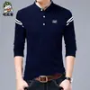 Camiseta de algodón de manga larga para hombre cuello liso color sólido joven y de mediana edad coreana ajuste slim camiseta interior ropa de otoño guapa venta al por mayor para hombre
