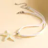 Collar con Colgante de Estrella de Mar Bohemio Europeo y Americano Transfronterizo Accesorios para Vacaciones en la Playa y la Costa Cadena para Clavícula de Mujer con Forma de Estrella