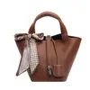 Bolsa Nova 2024 Feminina de Luxo Leve Nicho de Alta Qualidade Bolsa Saco Estilo Western Retrô Versátil Casual Bolsa Cesta de Piquenique