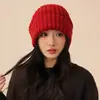 Gorro de lana de estilo japonés para mujer, gorro de punto versátil de estilo coreano para otoño e invierno, cálido, con protección para las orejas, gorro holgado de cabeza grande de fábrica