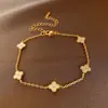 Pulsera Trenzada Hebilla de Herradura Redonda de Circonita Roja Europea y Americana Diseño de Nicho Pulsera Exquisita de Gama Alta para Mujer
