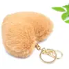 Venta caliente llavero de felpa de amor llavero de bola de pelo de corazón de melocotón colgante accesorios para equipaje de dama coche al por mayor