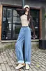 Foto Real de Dobladillo Curvo Jeans Versátiles Adelgazantes de Cintura Alta para Mujer Colección Primavera 2026, Pantalones Anchos Holgados, Pantalones Harem Cortos