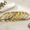 Pulsera floral de vid transfronteriza europea y americana con lazo, esmalte cloisonné, esmalte vintage, goteo de aceite, adornada con diamantes, diseño único