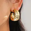 Juego de Doce Piezas de Pendientes Irregulares en Forma de C Transfronterizos Europeos y Americanos, Pendientes Geométricos Minimalistas con un Toque de Nicho de Alta Gama