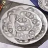 Estilo Europeo Transfronterizo Simple Moderno Fresco Hueso de China Plata Pista Plato para Comida Occidental Taza y Platillo Decoración para Filete Decoración de Mesa