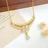 Collar de gota de agua con flor de circón exquisito de lujo ligero transfronterizo, diseño de nicho, cadena para clavícula de temperamento dulce y a la moda