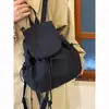 Mochila de Cordón a Cuadros Coreana Nueva de Gran Capacidad Versátil para Estudiantes y Viajes Cotidianos Mochila Ligera de Nylon de Nicho Bolsa Escolar
