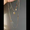 Collar Transfronterizo de Metal Nuevo con Corazón y Múltiples Borlas, Cadena para Clavícula de Moda Elegante Nicho Vintage Retro para Mujer