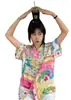 Camisa Retro Americana Estilo Hong Kong con Estampado de Rosas de Manga Corta para Mujer, Nuevo Diseño de Verano 2026 Top de Nicho